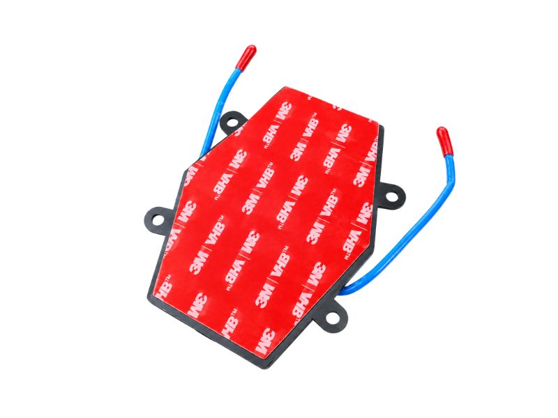 Thermal aerosol fire extinguisher with adhesive mounting back